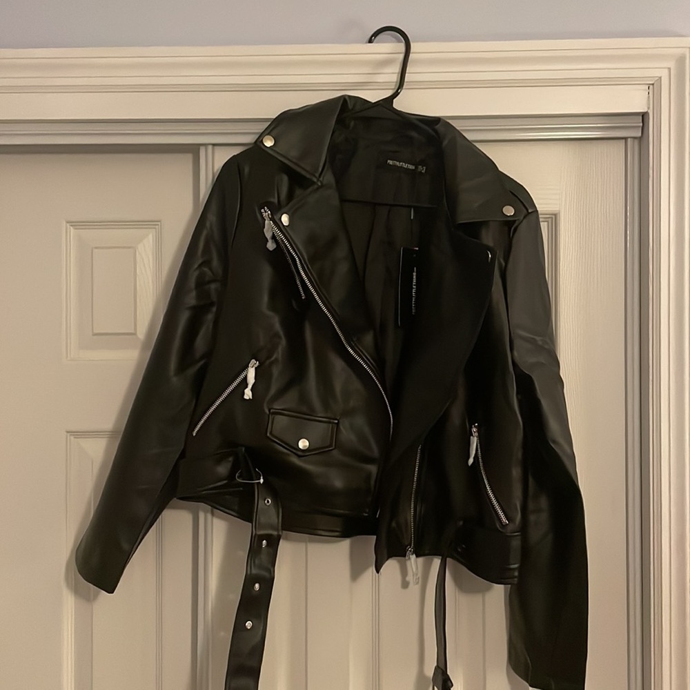 PLT faux leather jacket NEVER WORN and has no smell (some faux leathers do)